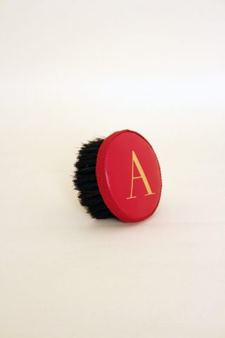 Brush with embossed letter A